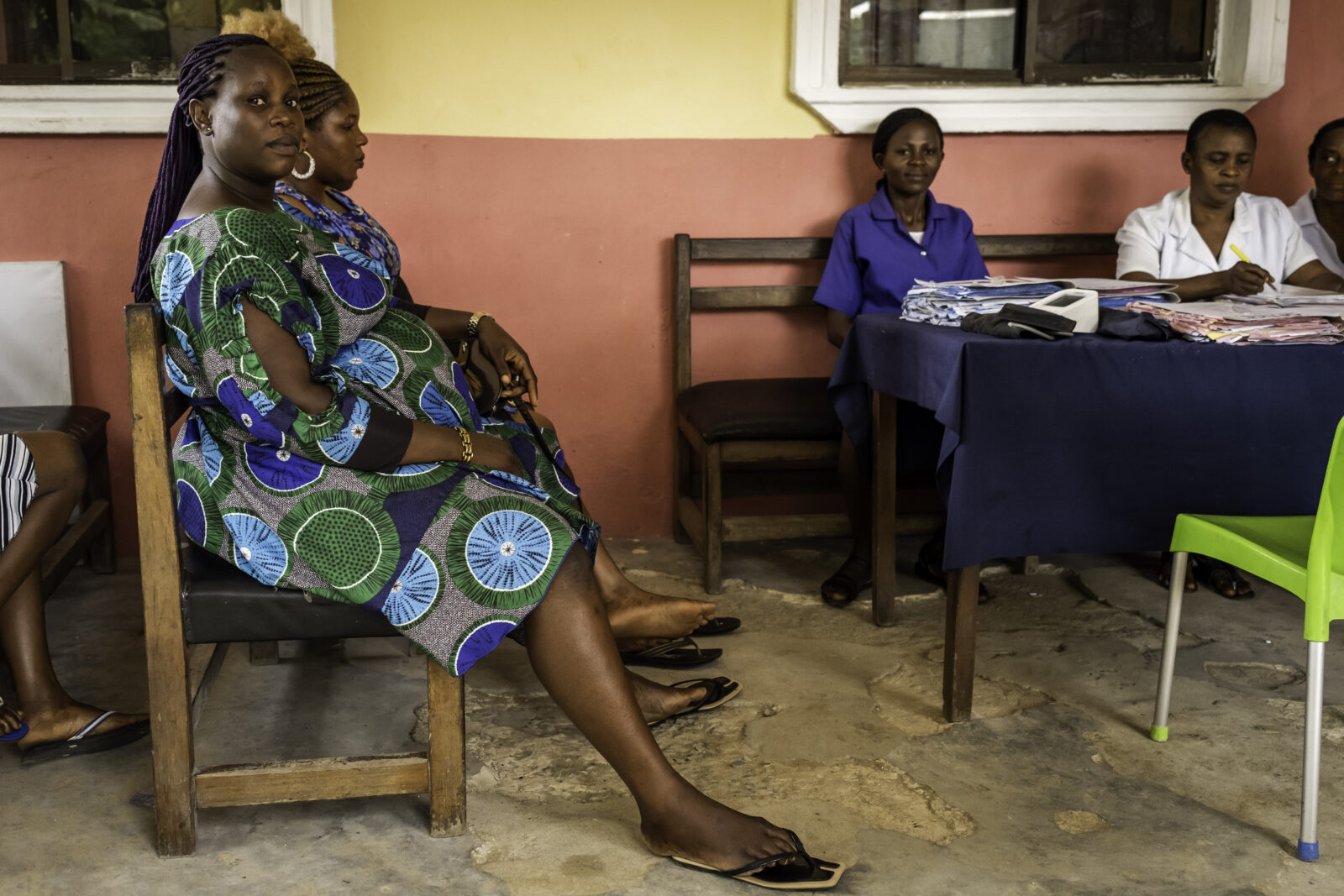 Abasiama sits in the queue with other expectant mothers as they wait to be attended to by the nurses in the Primary Health Centre Base, Uyo Akwa Ibom State, Nigeria