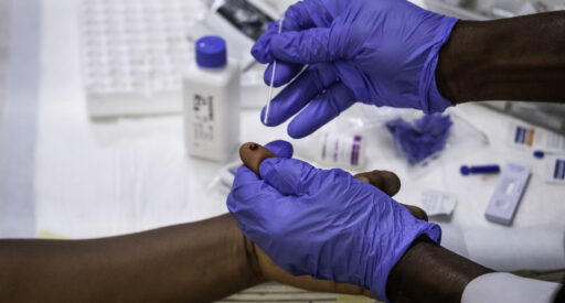 Godwin Neebeh, a laboratory technician, sets up to conduct a HIV and syphilis test with the dual kits in Rivers State University Teaching Hospital, Port Harcourt Rivers State, Nigeria