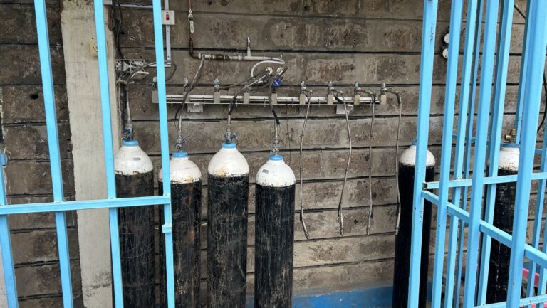 A series of oxygen tanks outside a healthcare centre in Kenya.